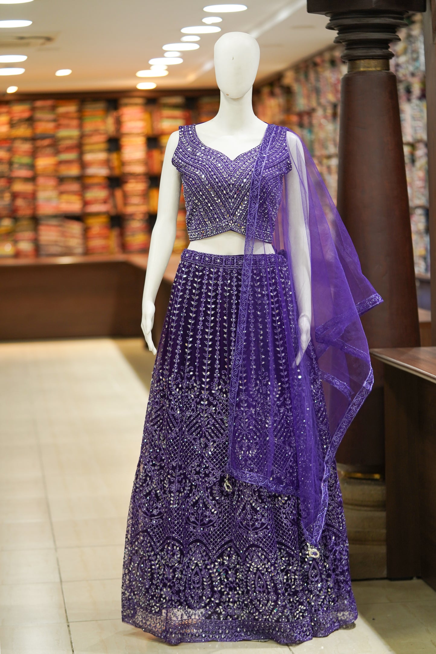 Blue stonework net lehenga