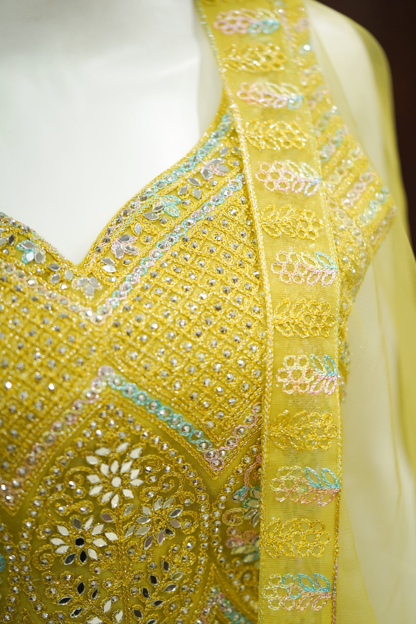 Yellow stonework net lehenga