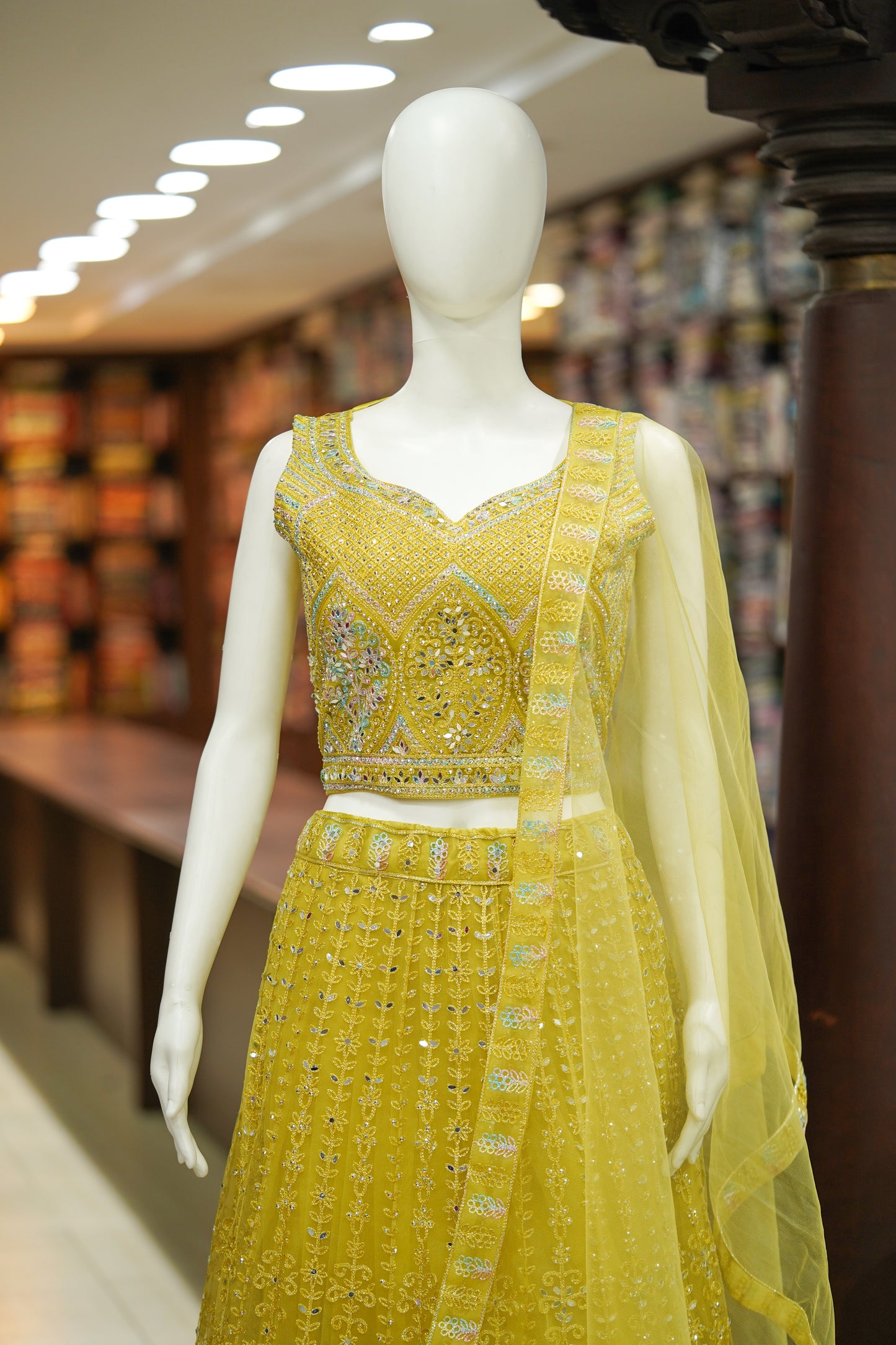 Yellow stonework net lehenga