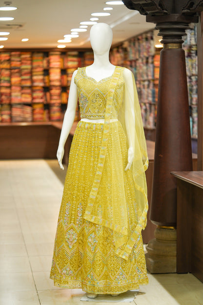Yellow stonework net lehenga